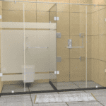 Jaquar shower enclosure - frameless IARA series, T-shaped bathroom cabin separating two shower/wc areas with a common glass, two doors in the front, fixed on the common glass
