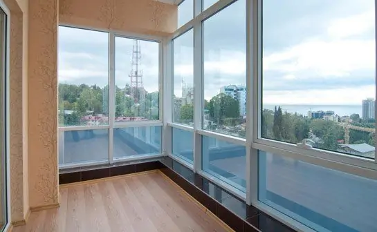 white full-size window with wooden flooring