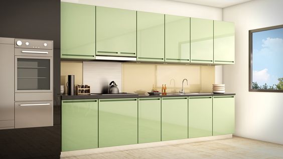 glass cooking area in green shade with in built stainless steel body oven