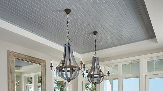 grey false ceiling for kitchen cum dining room with two pendant lights