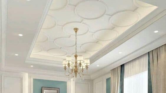 layered ceiling with wallpaper and chandelier for living room in white and blue shades