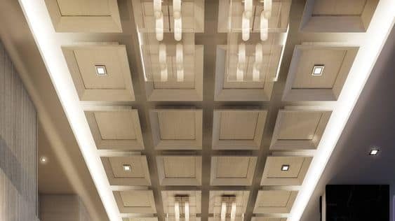 High ceiling with ceiling design and heavy lighting