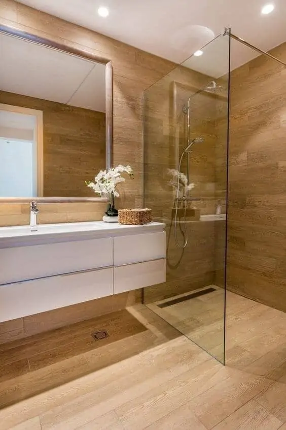 Wood and white washroom tile and floor