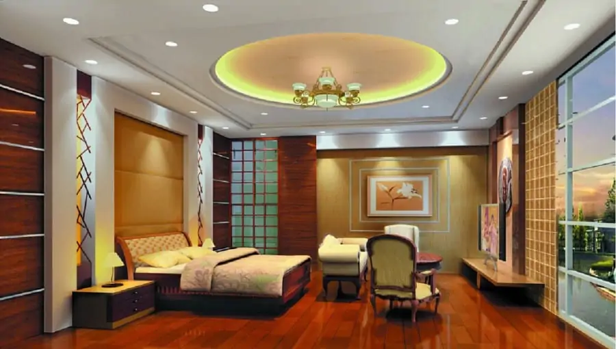 A circular false ceiling makes the bedroom grander.