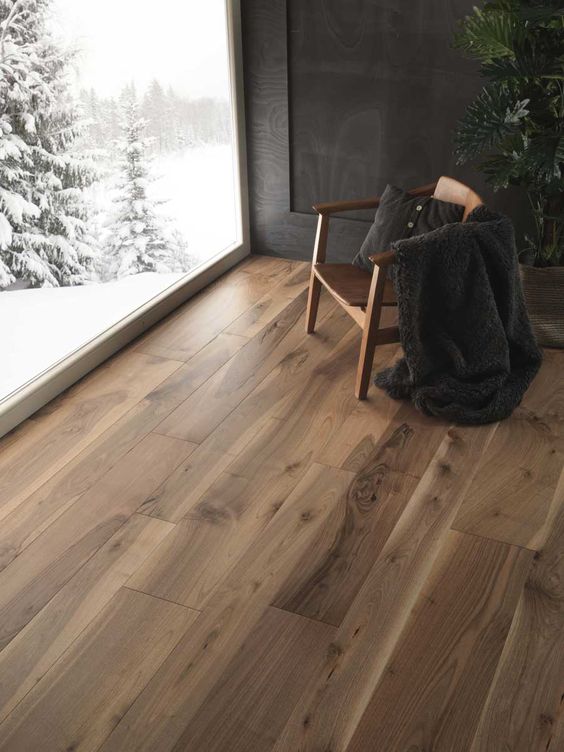 wooden textured flooring with a relaxing chair