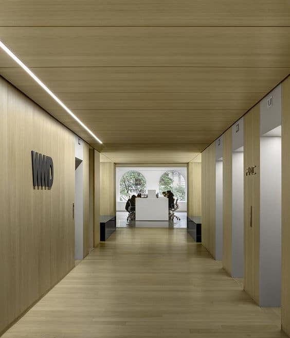 wooden false ceiling for hallway leading to conference room 