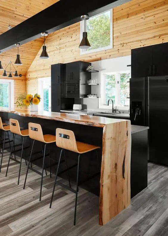 wooden countertop with black table, cabinets, and interiors