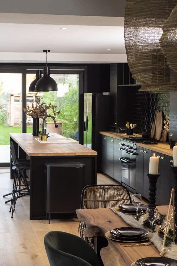 black kitchen interiors with wooden countertop designs. 