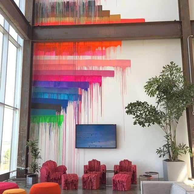 colourful rainbow lines on a white wall of living room