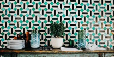 green, black and white geometric tile wall