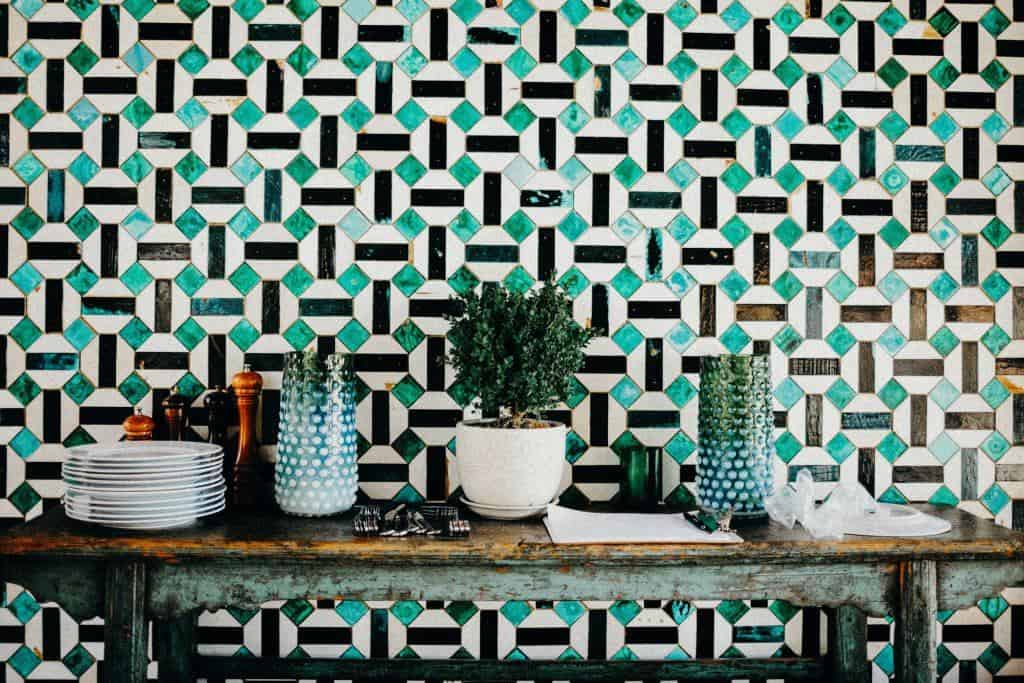 green, black and white geometric tile wall