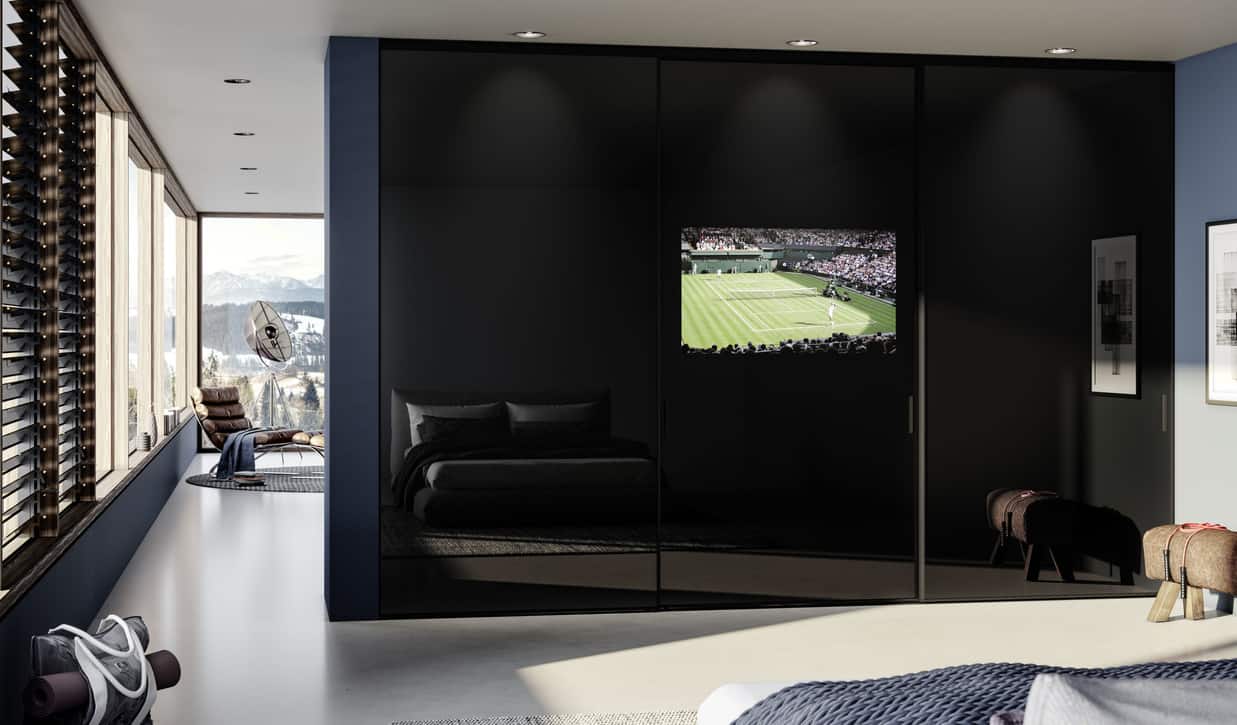 Raumplus wardrobe sliding doors with TV integration at Wholesale Price! Multi- functional sliding doors for your homes