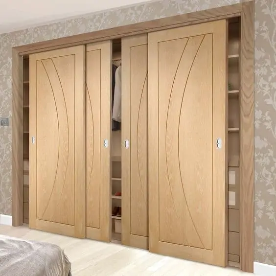 4 door wooden closet with sliding doors