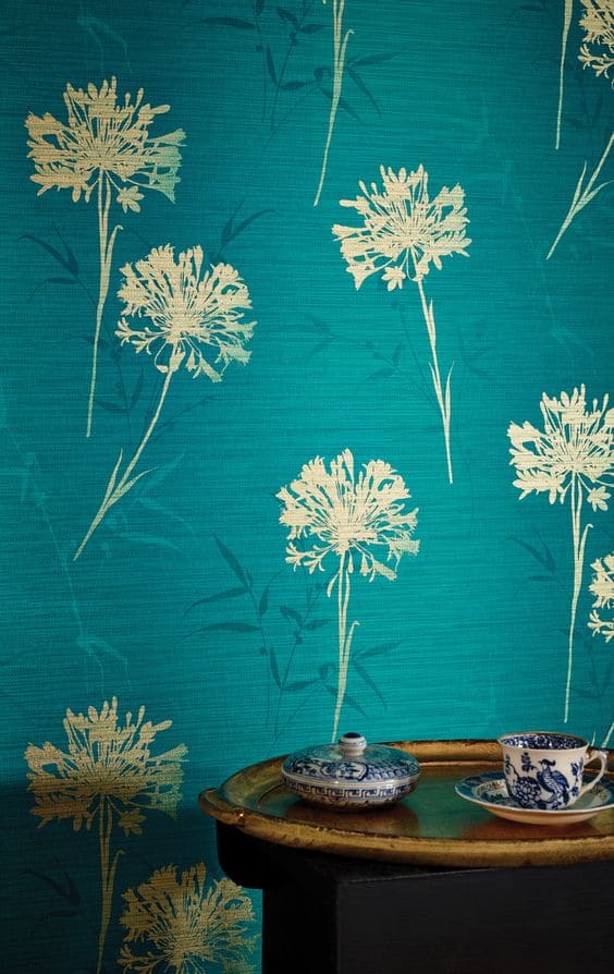 blue textured paint with golden floral stencil