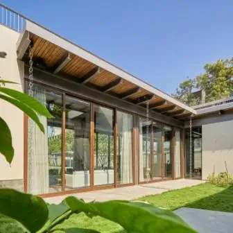 Wood shade with glass walls for sustainability in living