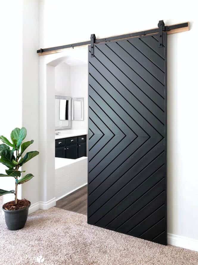black barn style sliding bathroom entrance