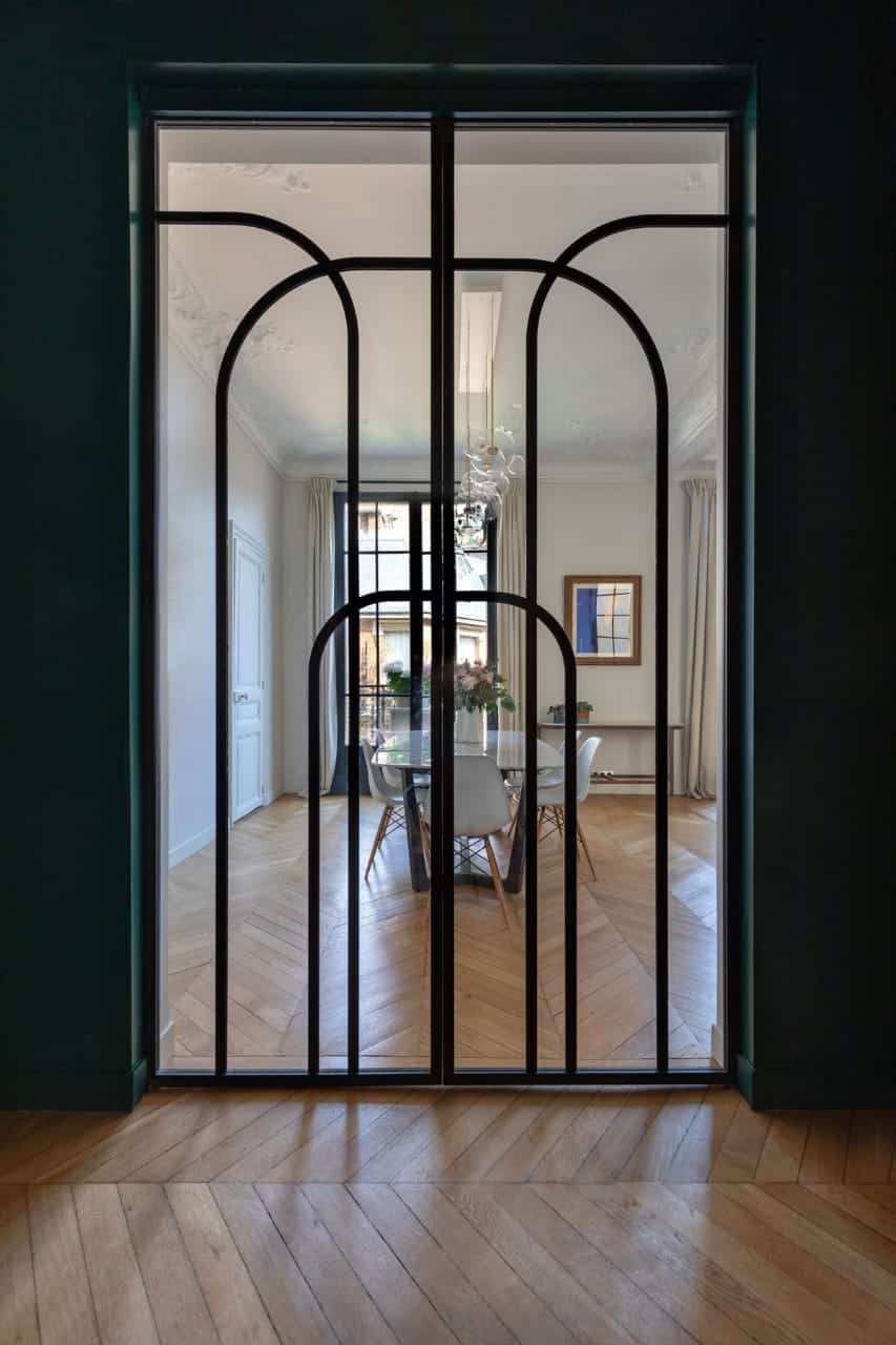 tall glass door with black metal frame