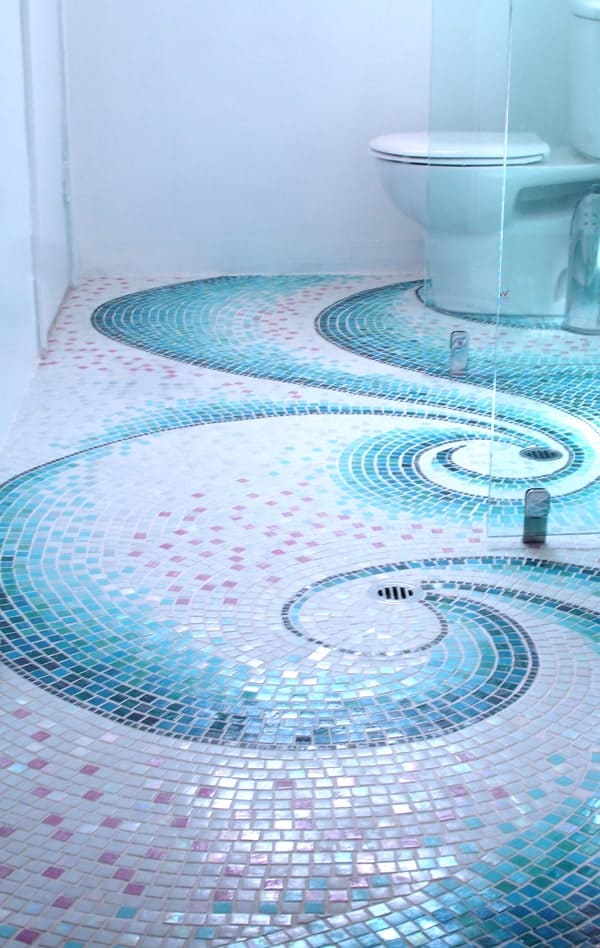 mosaic floor for bathroom with a white bathtub