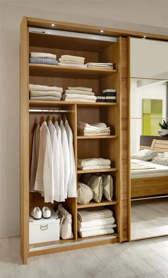 brown wardrobe carcass with sliding glass door