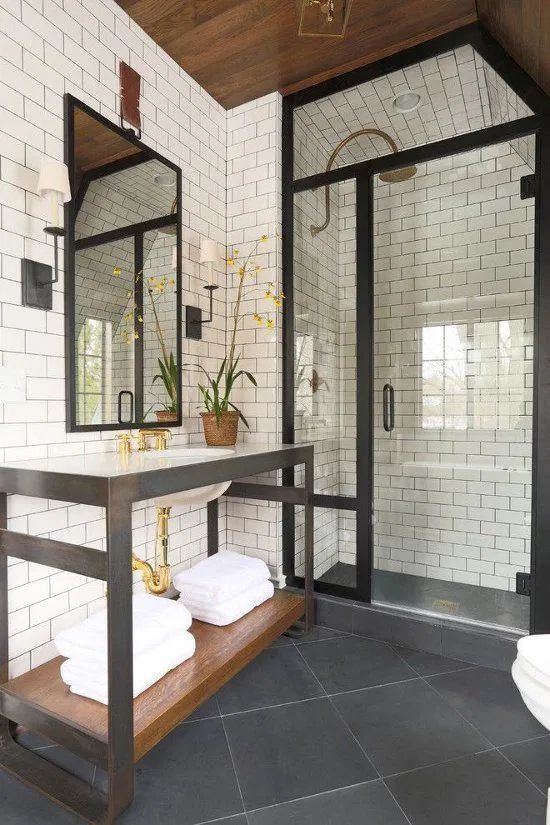 IPS flooring for a bathroom with black glass door profile and mirror