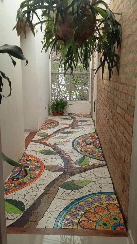 multi-coloured mosaic floor for pathway of a lawn