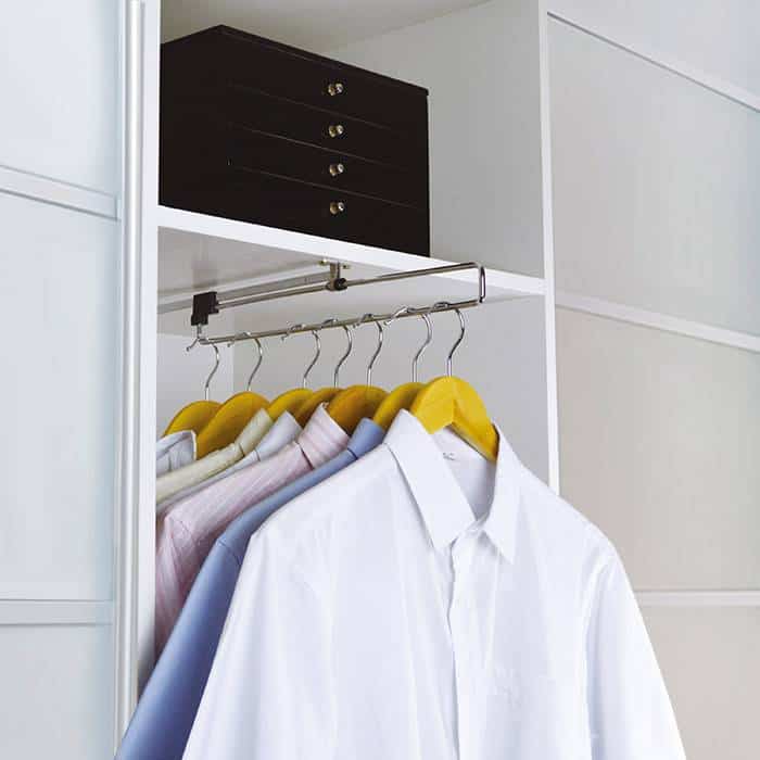 Pull-out rail for wardrobes
