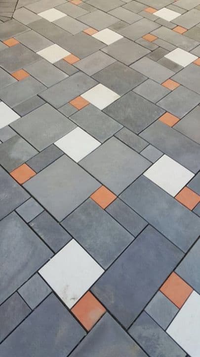 muli-coloured stone flooring tiles with white, grey and orange flooring