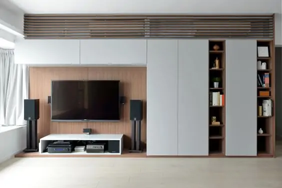 Stylish white wardrobe design with TV cabinet.