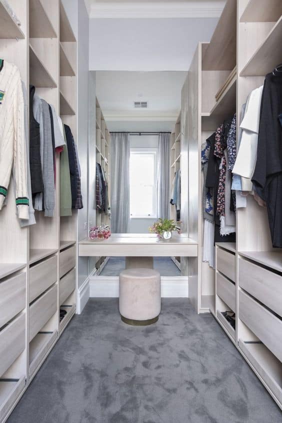 white walk-in wardrobe designs on both sides with front dressing table set up