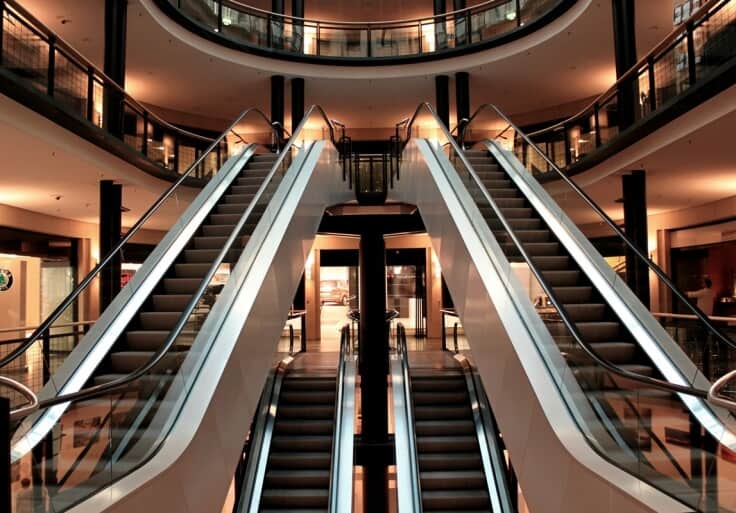 Stylish escalator design with glass handrails