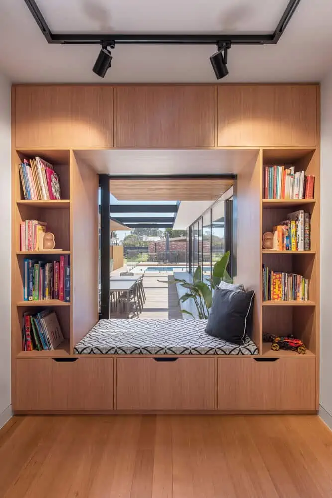 home design interior with wood bookshelf and a window