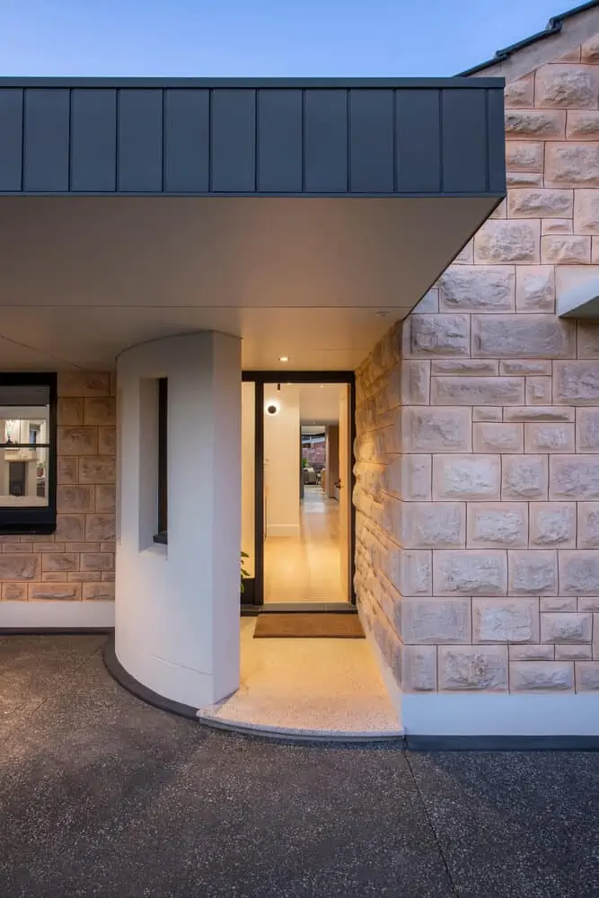 home designs interior having a faux brick wall and wooden plank ceiling