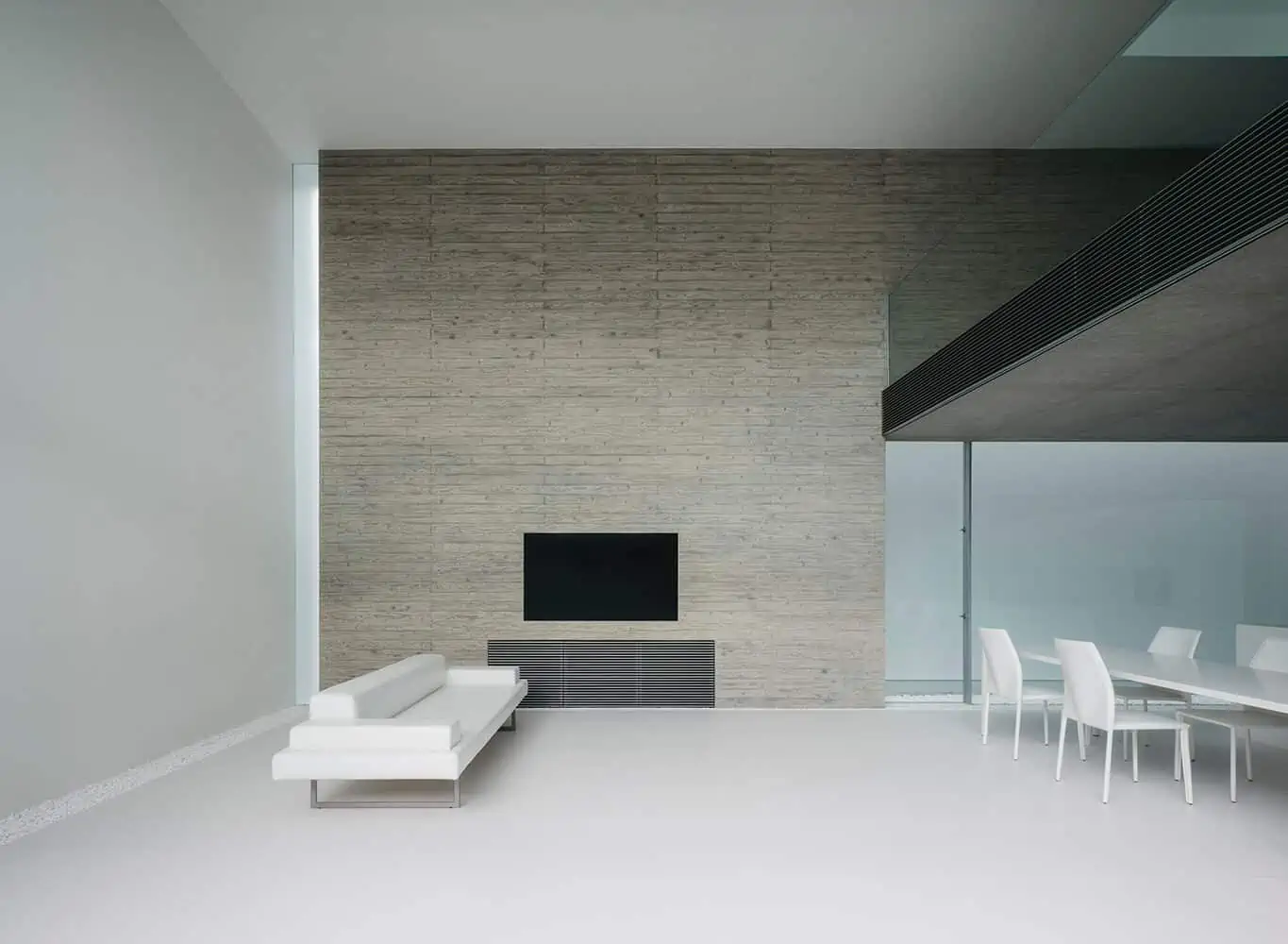 minimalistic living room with a white themed decor