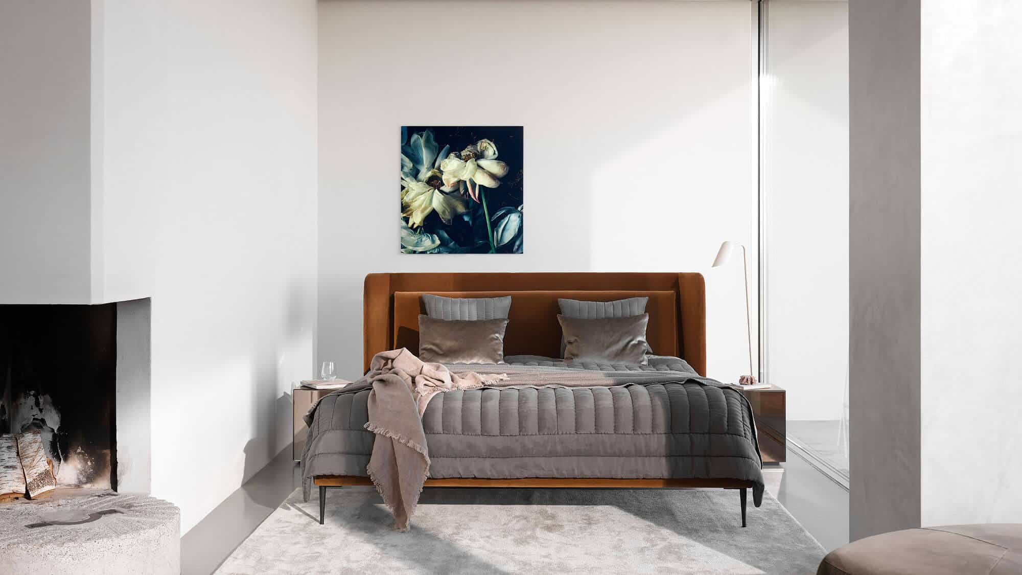 brown upholstered luxury bed by Boconcept
