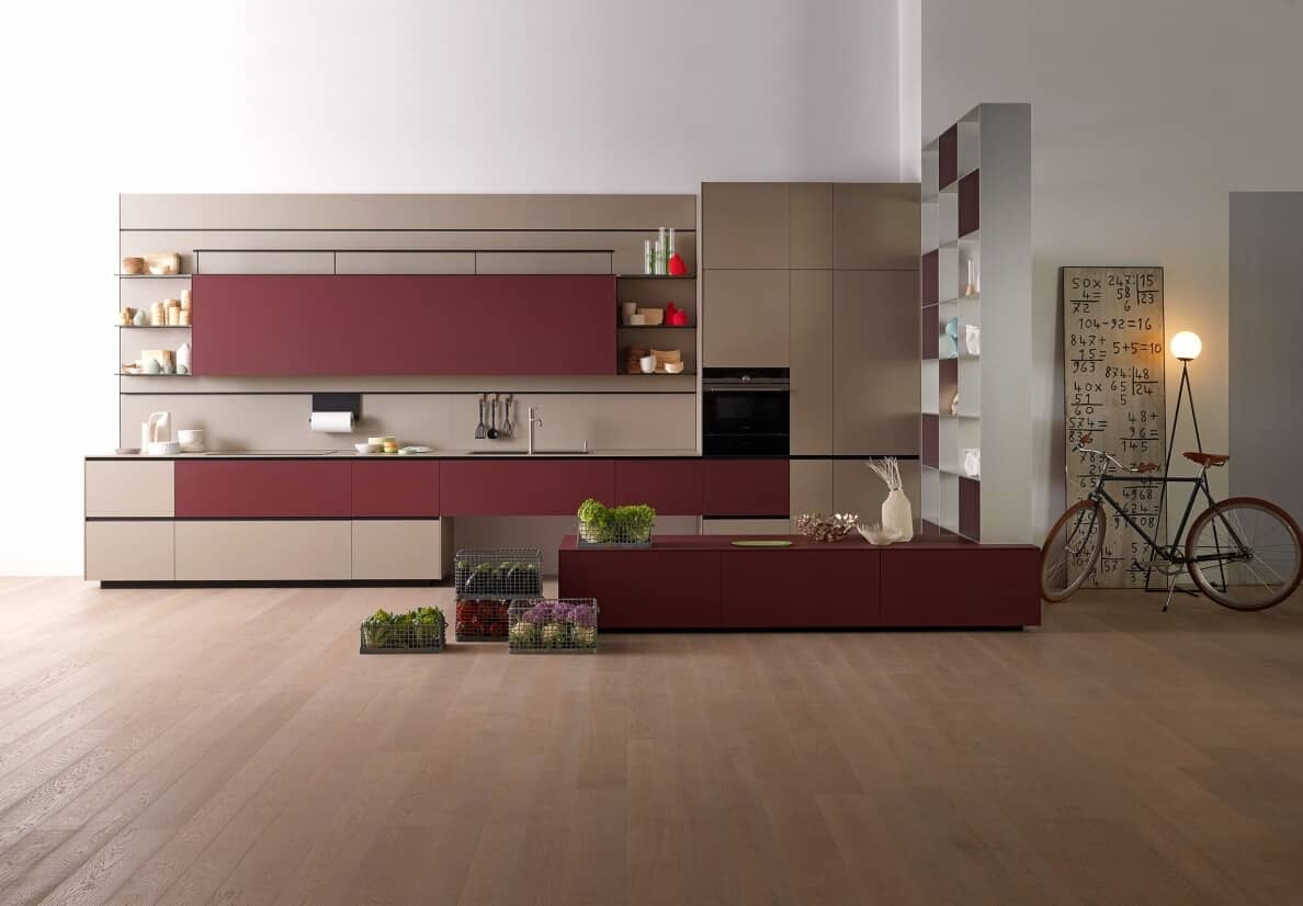 designer kitchen island with cabinets and cupboard in red colour 