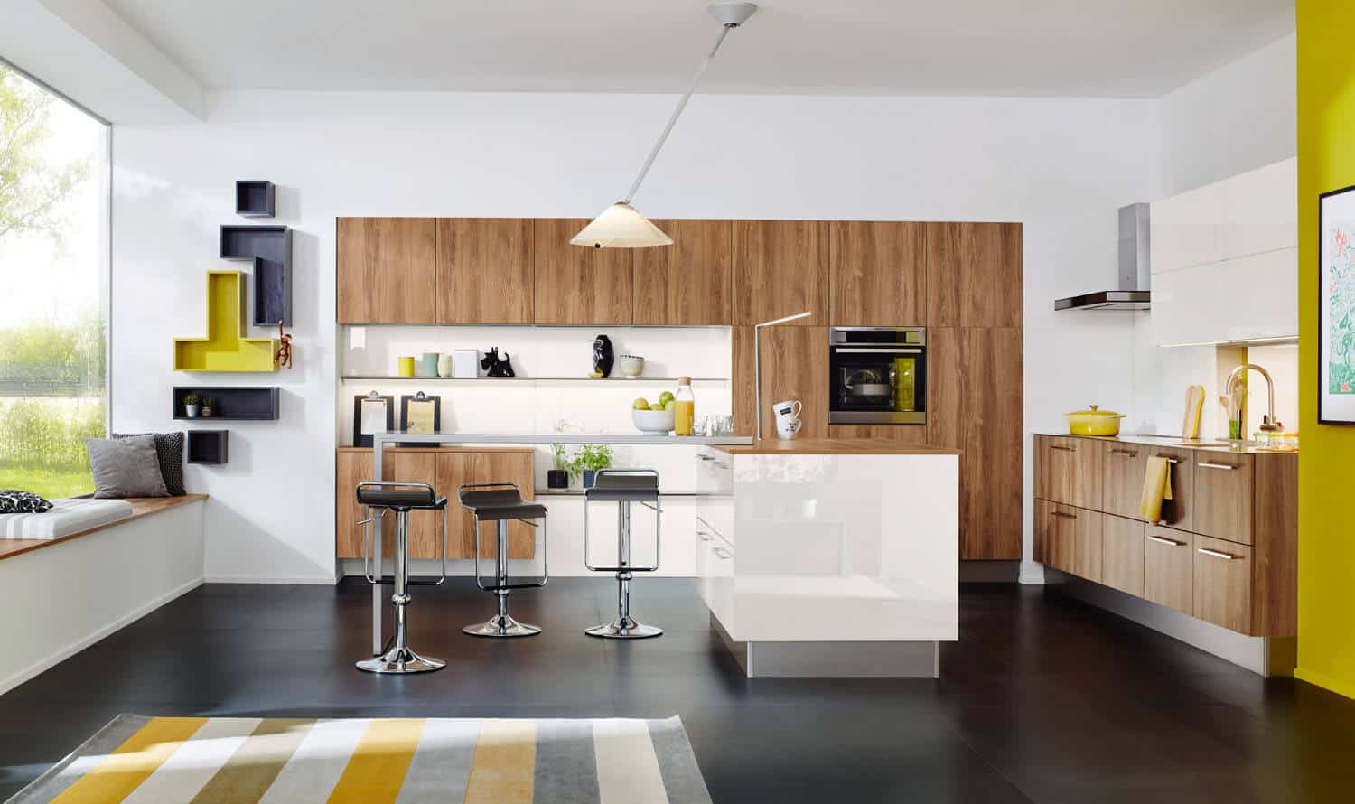 Designer ktichen in bright colours with cabinet and cupboard
