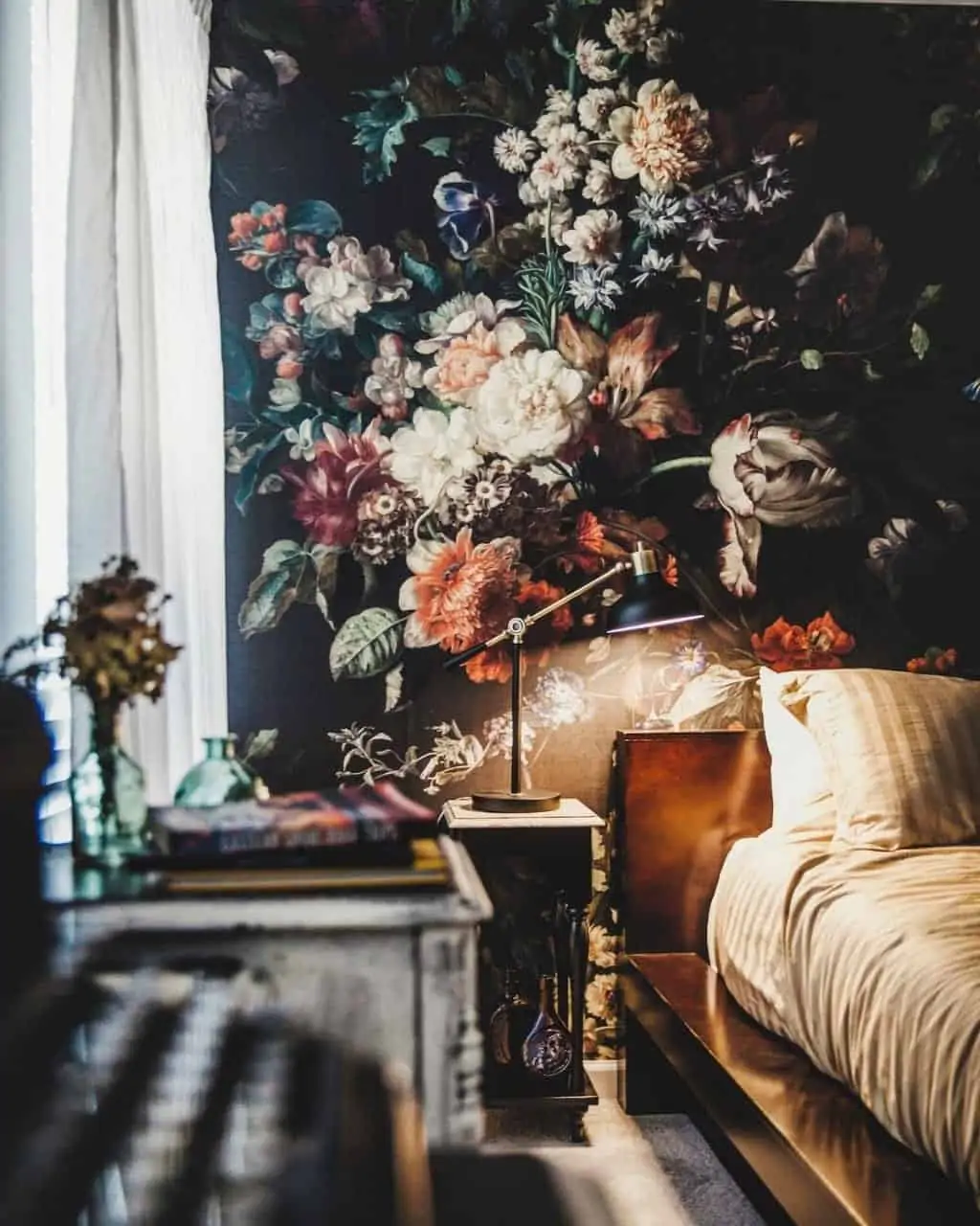 black floral wallpaper that creates a stunning fusion of themes