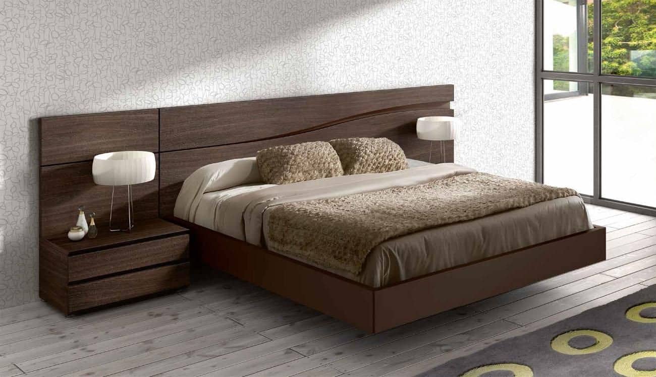 dark stained wooden platform double bed with bedside table