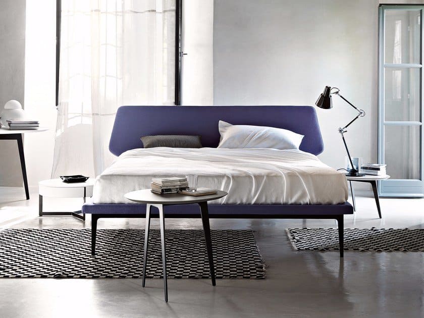  blue up،lstered bed with a mid-century makeover