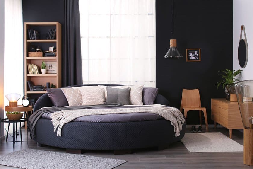  Upholstered round padded designer bed