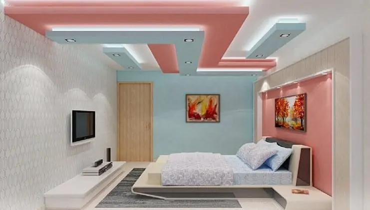 peach and blue bedroom false ceiling with concealed lighting