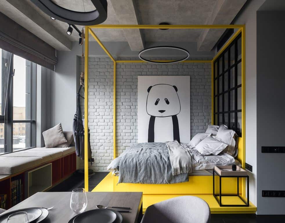 yellow four poster bed to pack a punch of colour