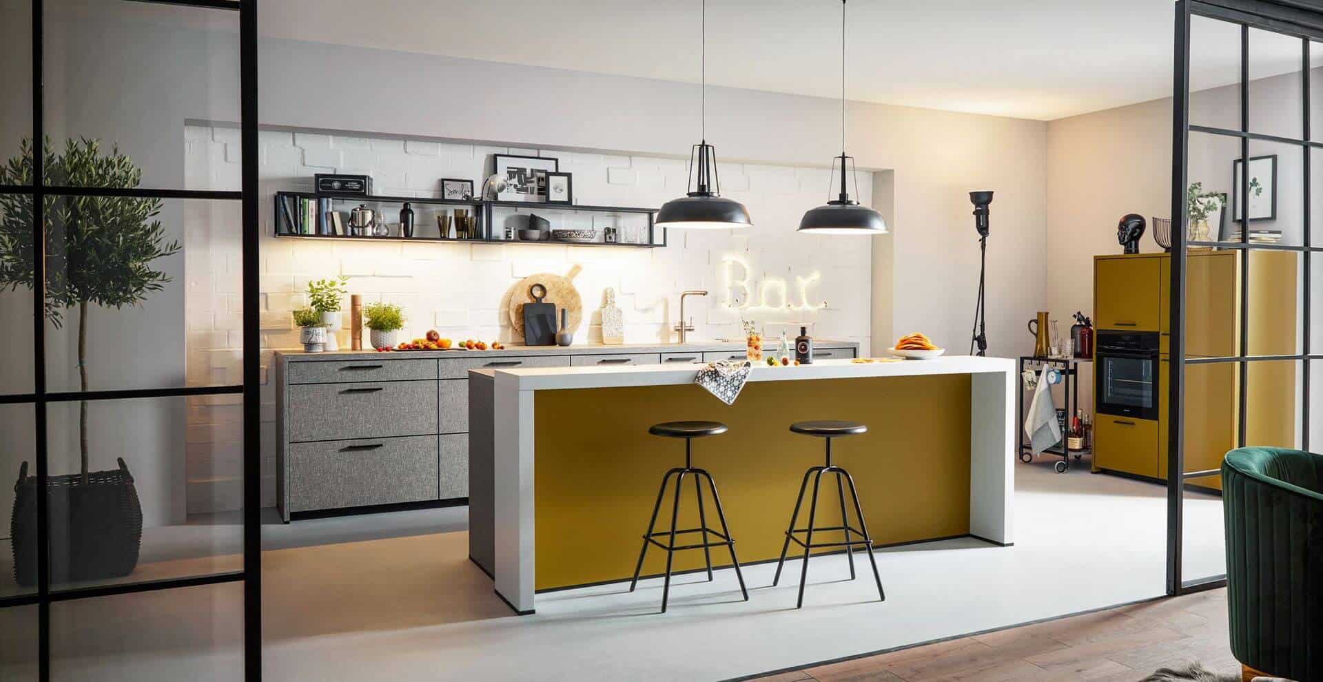 Designer kitchen in subtle colours with cabinet and cupboard