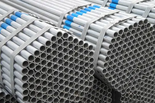  galvanized iron pipes stacked on top of each other 