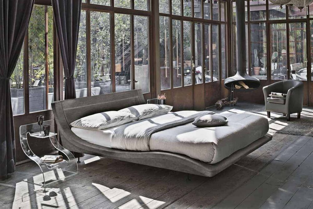 grey sleigh bed in rustic bedroom