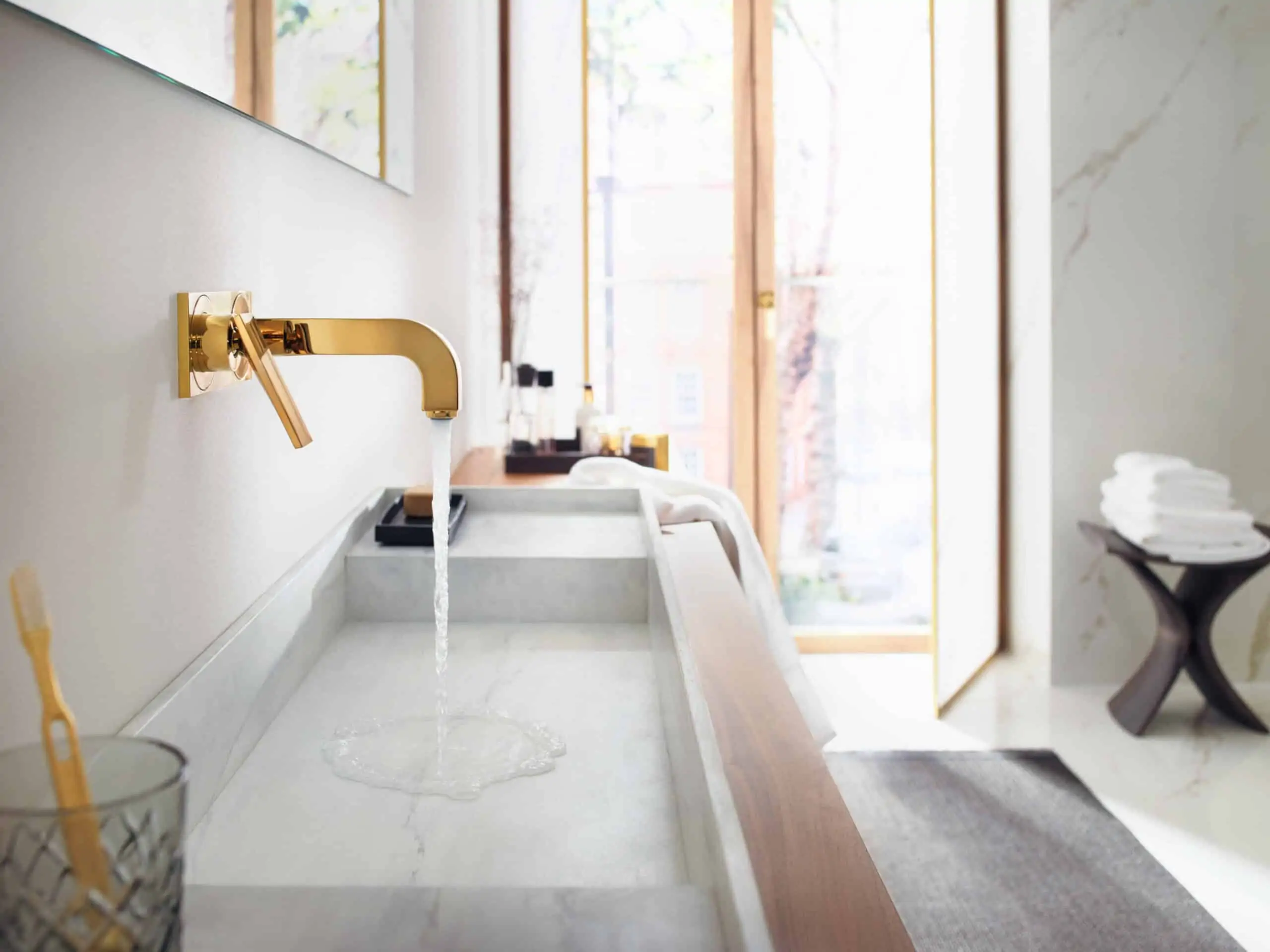 AXOR Citterio modern bathroom design collection, gold wall-mounted faucet