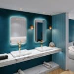 bathroom mirror lights in a modern bathroom by Villeroy & Boch with white hand washbasins and golden faucets