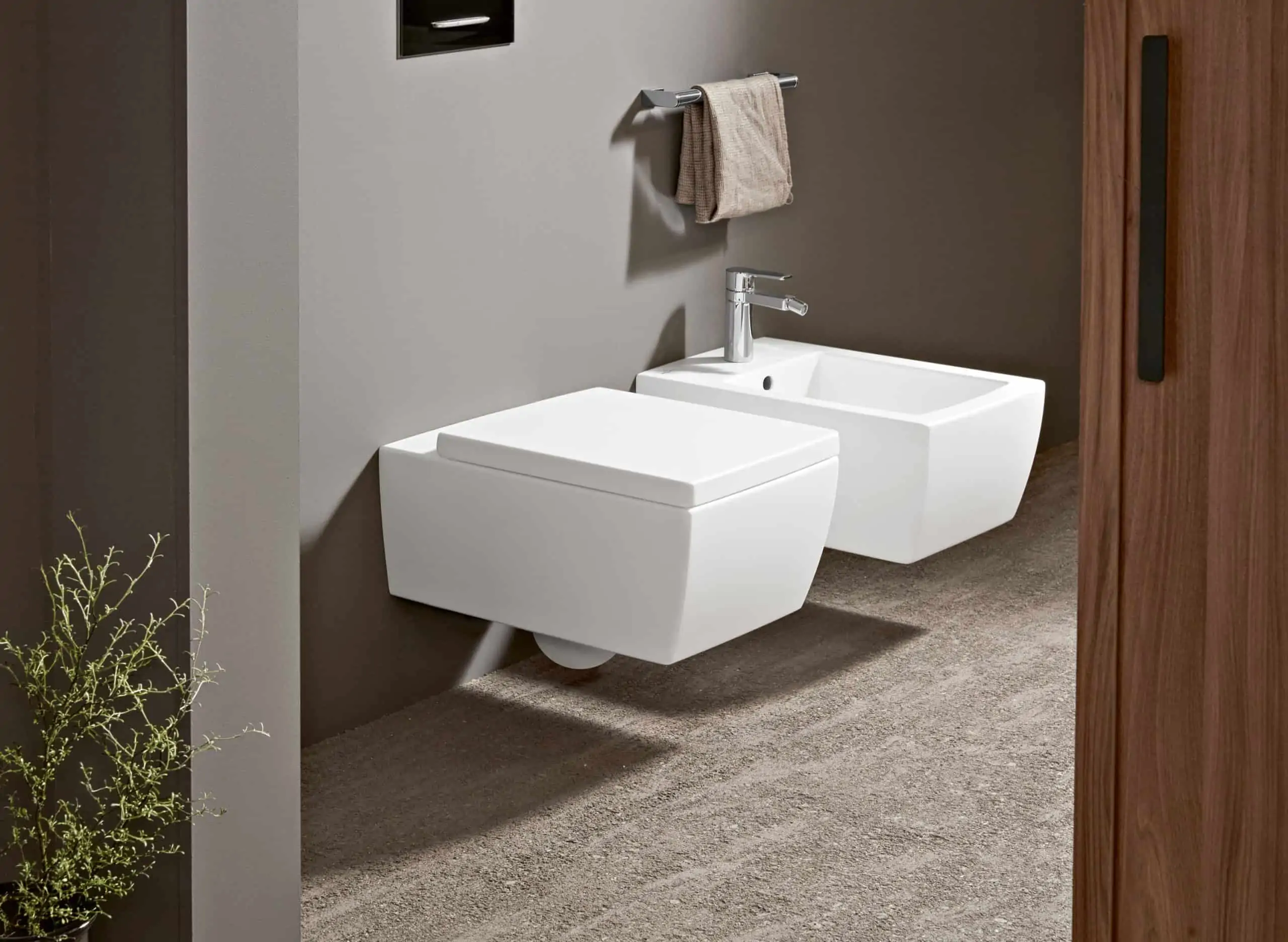 White wall-mounted toilet and bidet, villeroy & boch modern bathroom collection