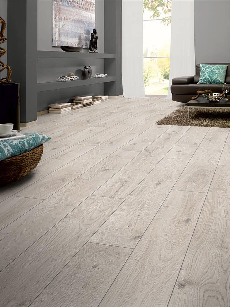Laminate flooring tiles aren't waterproof. Wood laminate flooring price is available at Nitco, Pergo etc. 