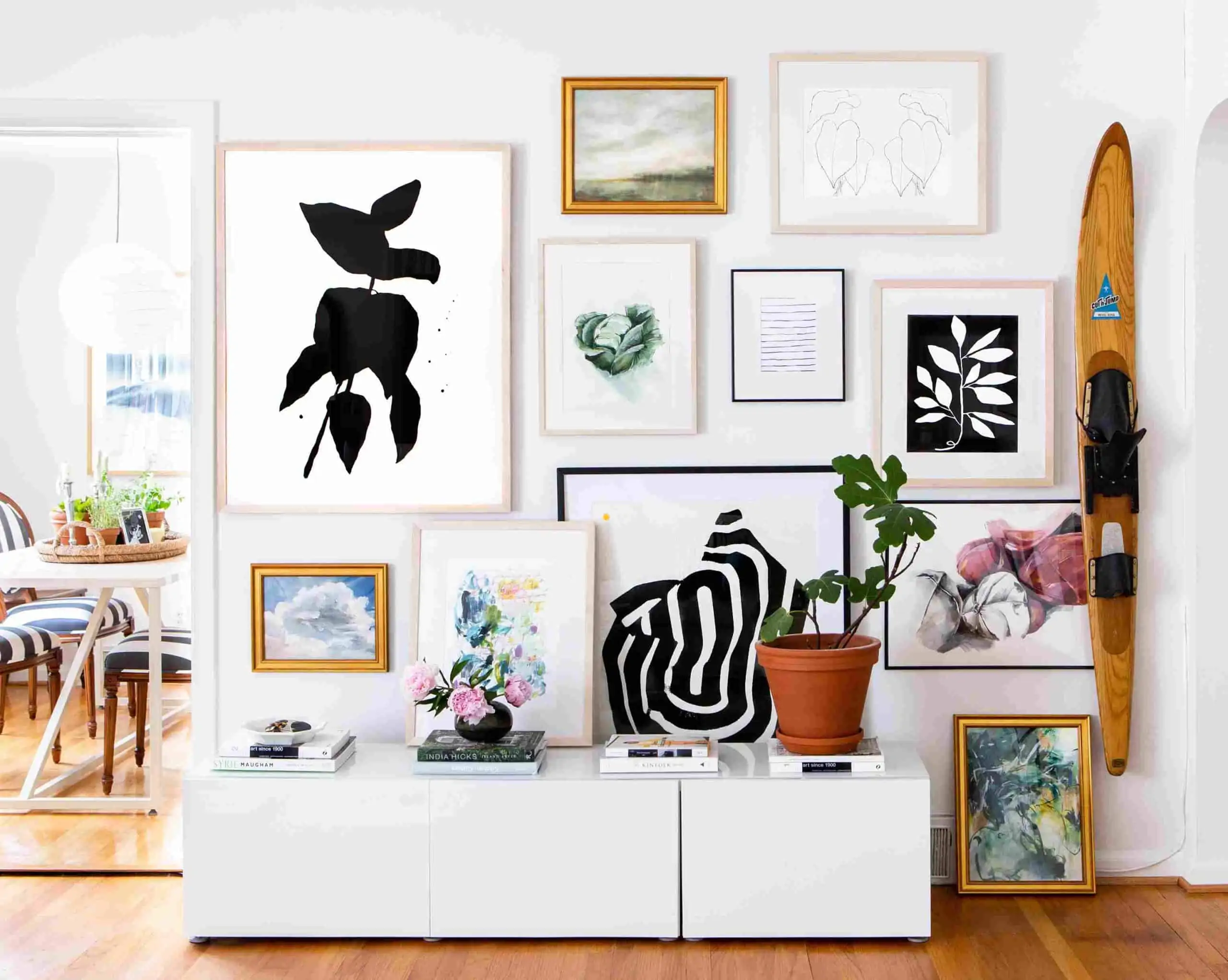 living room wall design with artwork; gallery wall in living room